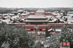 资料图：小雪到来前，北京迎今冬首场降雪。中新网记者 金硕 摄 - 浙江网