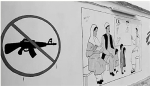 阿富汗经常发生武装冲突，医院门口画着“禁止使用武器”的标志。 - 浙江网