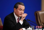 3月8日，外交部部长王毅就“中国的外交政策和对外关系”相关问题回答中外记者提问。中新社记者 杜洋 摄 - 浙江网