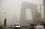 5月4日，北京城区遭沙尘笼罩。中新社记者 富田 摄 - 浙江新闻网