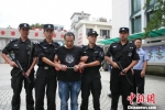 图为：案犯罗云洪被捕归案。　台州公安供图 - 浙江新闻网