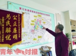 张伟办公室里的望江地区征迁地块图。 时报记者 李睿 摄 - 浙江新闻网