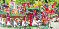每年端午节，杭州骆家庄龙舟赛都吸引了大批游客。（资料照片） 本报记者 张孙超 阮西内 摄 - 浙江网