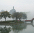 图为3月28日，平流雾中的桂林老八景“塔山”。 唐梦宪 摄 - 浙江新闻网