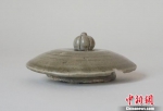 图为出土器盖。宁波市文物考古研究所提供 - 浙江新闻网
