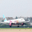 首架杭州亚运会彩绘飞机。　董岳敏　摄 - 浙江网